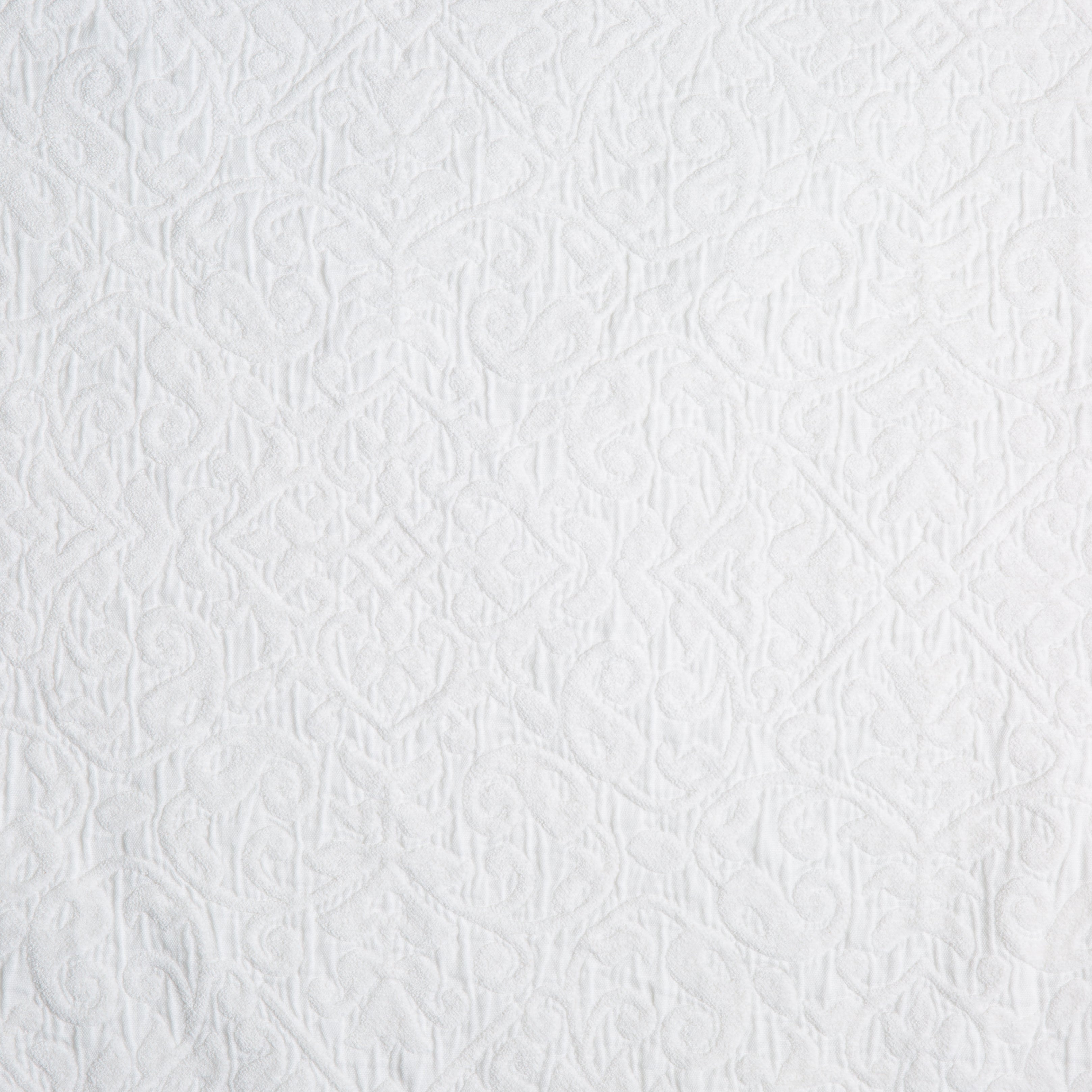 White: A close up of cotton chenille fabric in classic white.