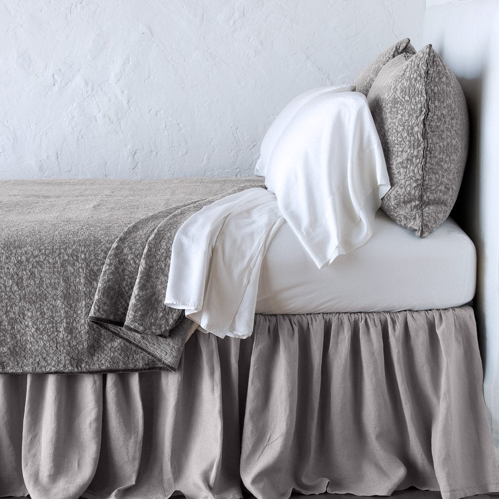 : Vienna shams and matching coverlet over white sheeting - fog, side view.