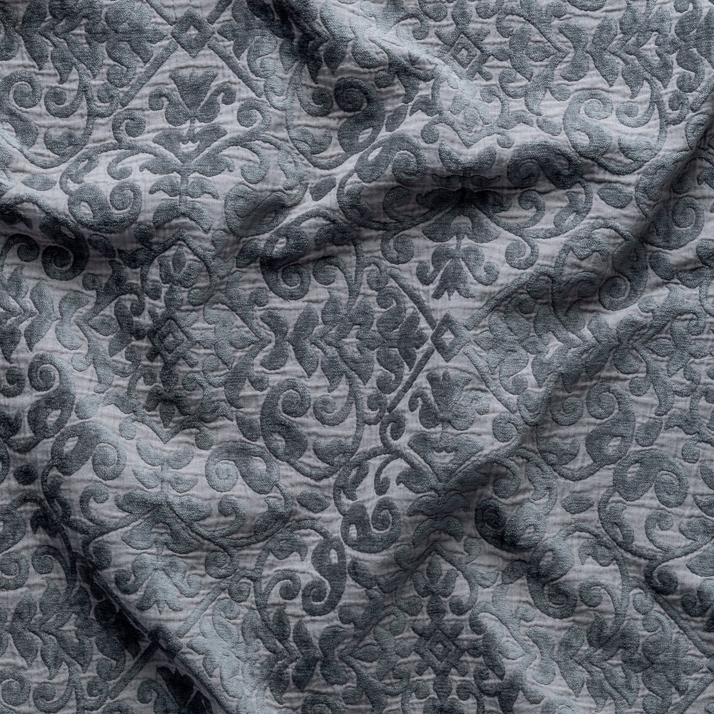 Moonlight: A close up of Vienna cotton chenille jacquard in moonlight, a saturated, cool, mid-dark grey tone. 