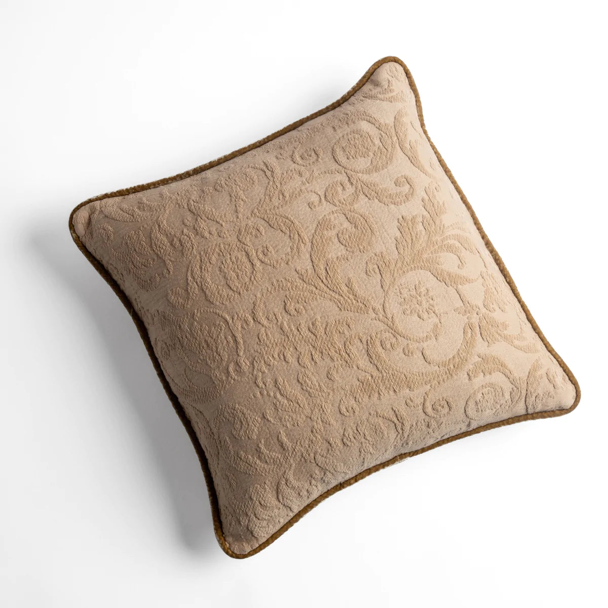 Honeycomb: Organic cotton damask square pillow with silk velvet trim on white background — overhead angle.