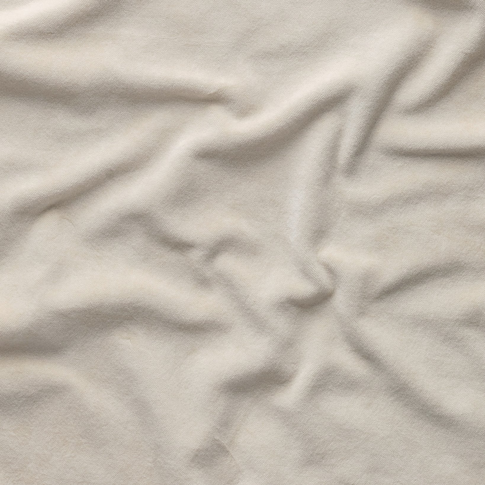 Parchment: A close up of cotton velvet in parchment, a warm, antiqued cream.
