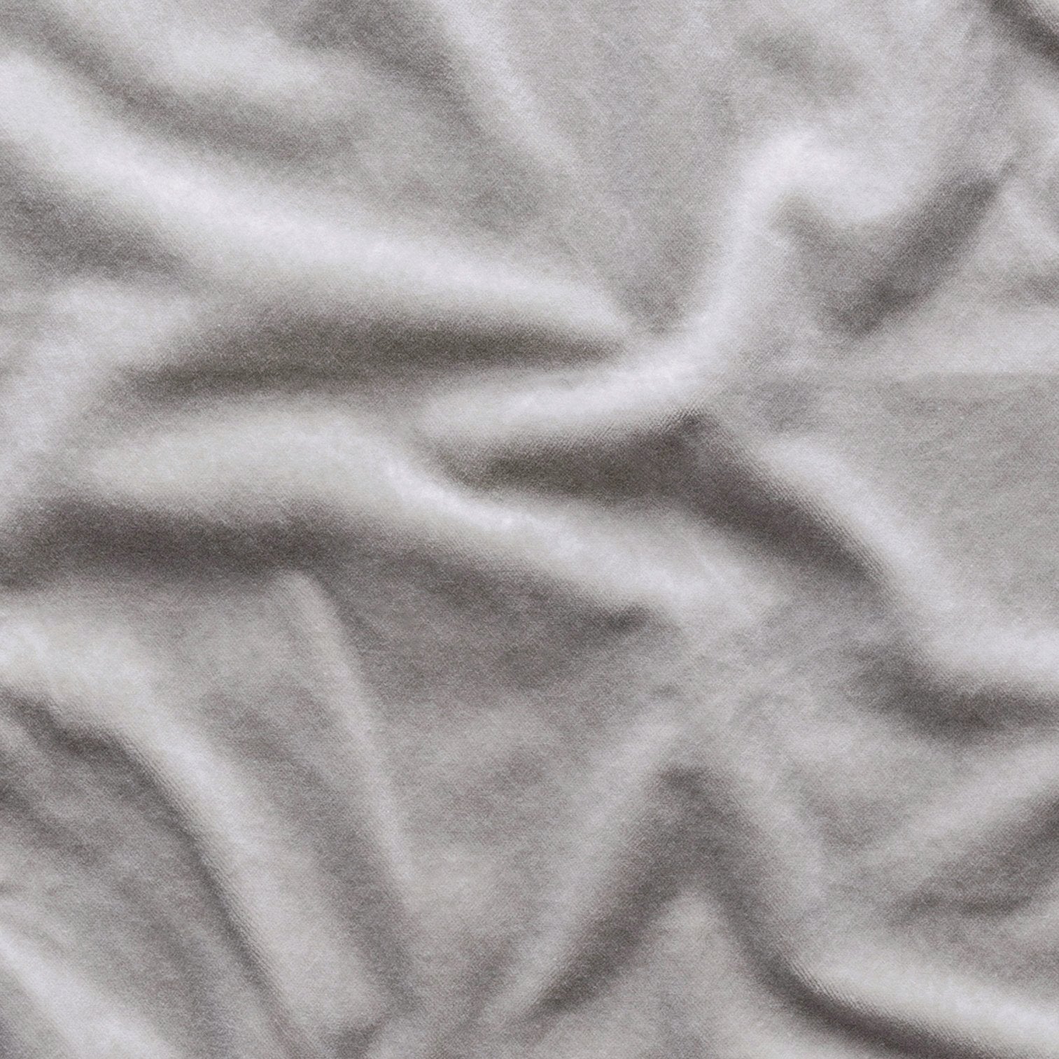 Sterling: A close up of cotton velvet in sterling, a silvery neutral light grey. 