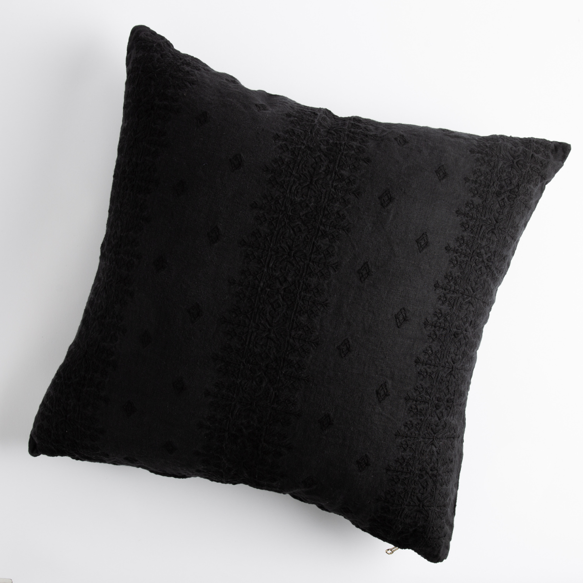 Corvino: pillow on a white background - overhead view.