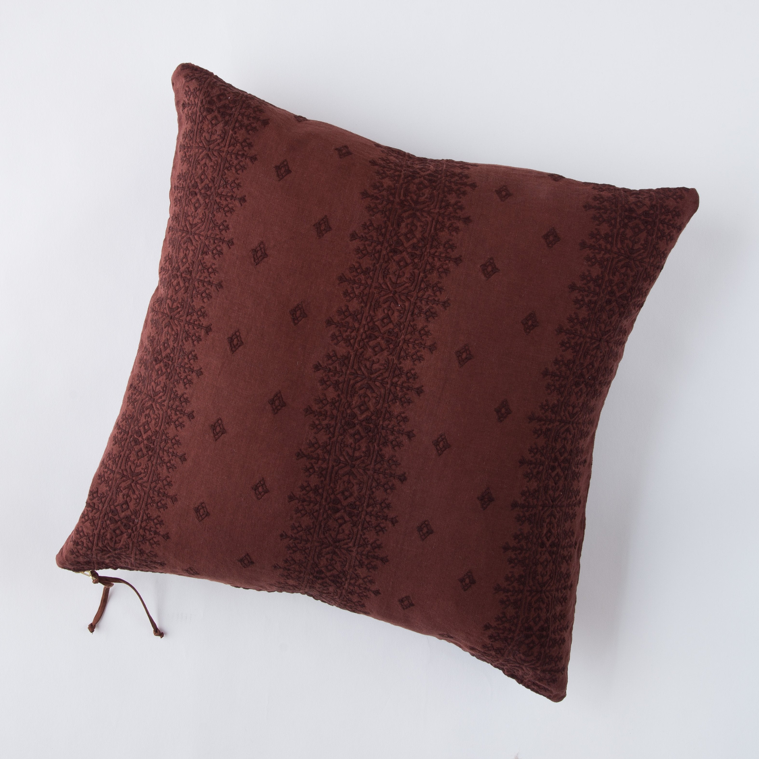 Mahogany: pillow on a white background - overhead view.
