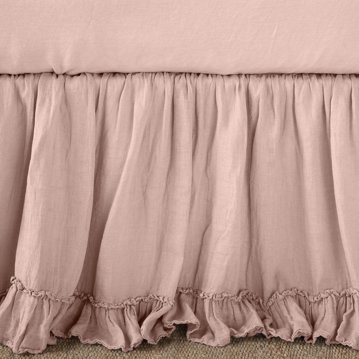 Rouge: Close up of bed skirt, showcasing ruffle detail - side view.