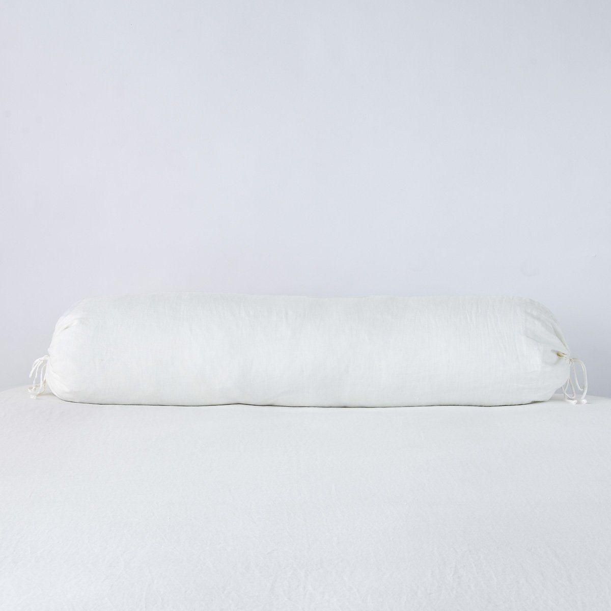 Winter White: bolster against a white background.