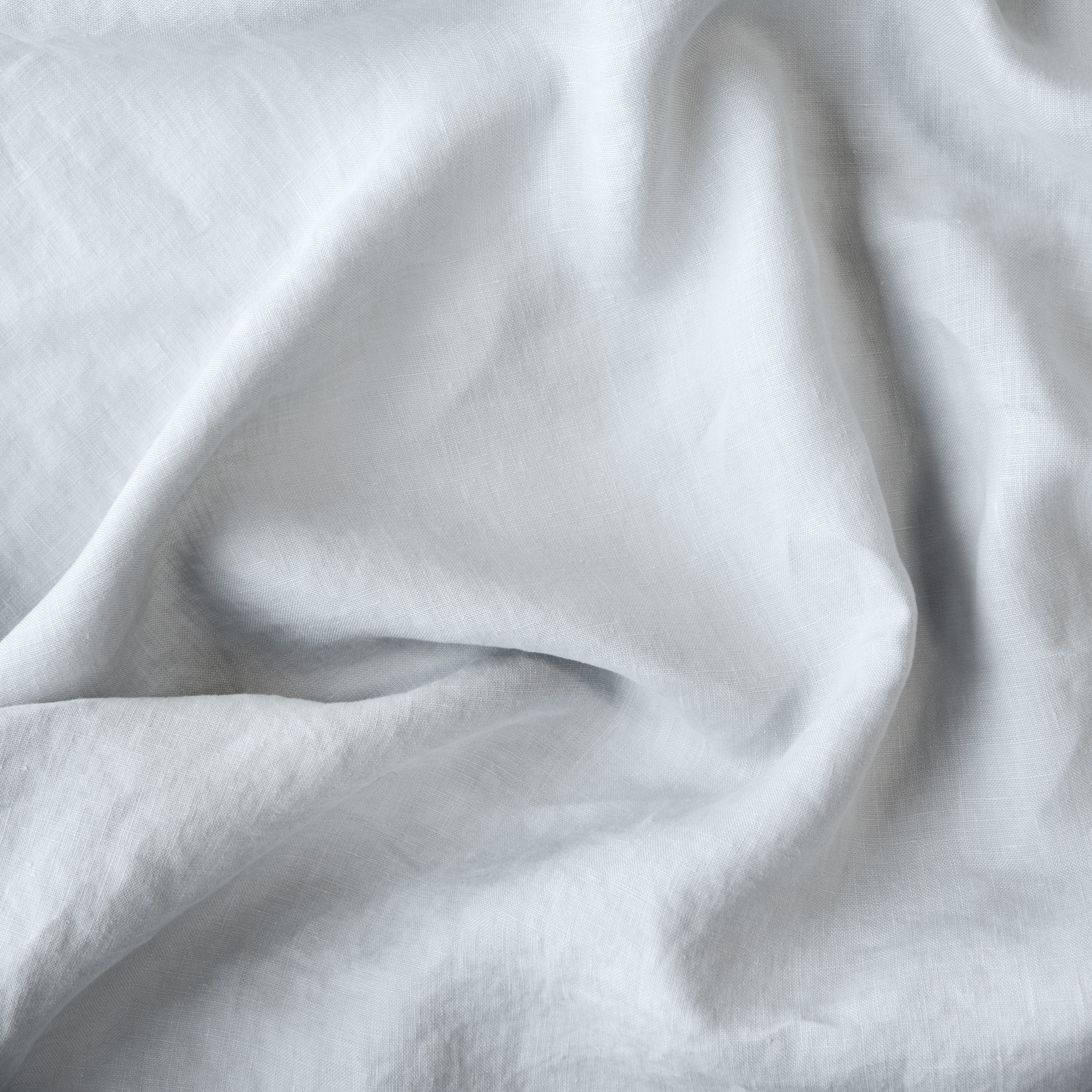 Cloud: A close up of linen in cloud, a soft, subtle sky blue-grey. 