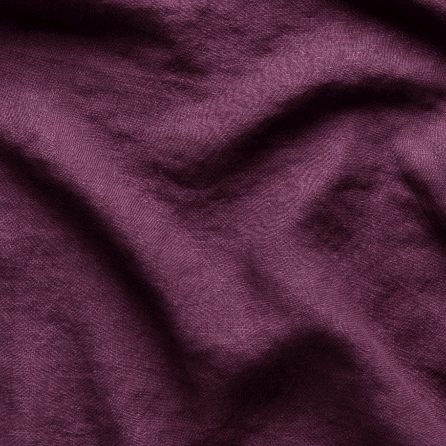 Fig: A close up of linen in fig, a richly saturated purple-garnet. 