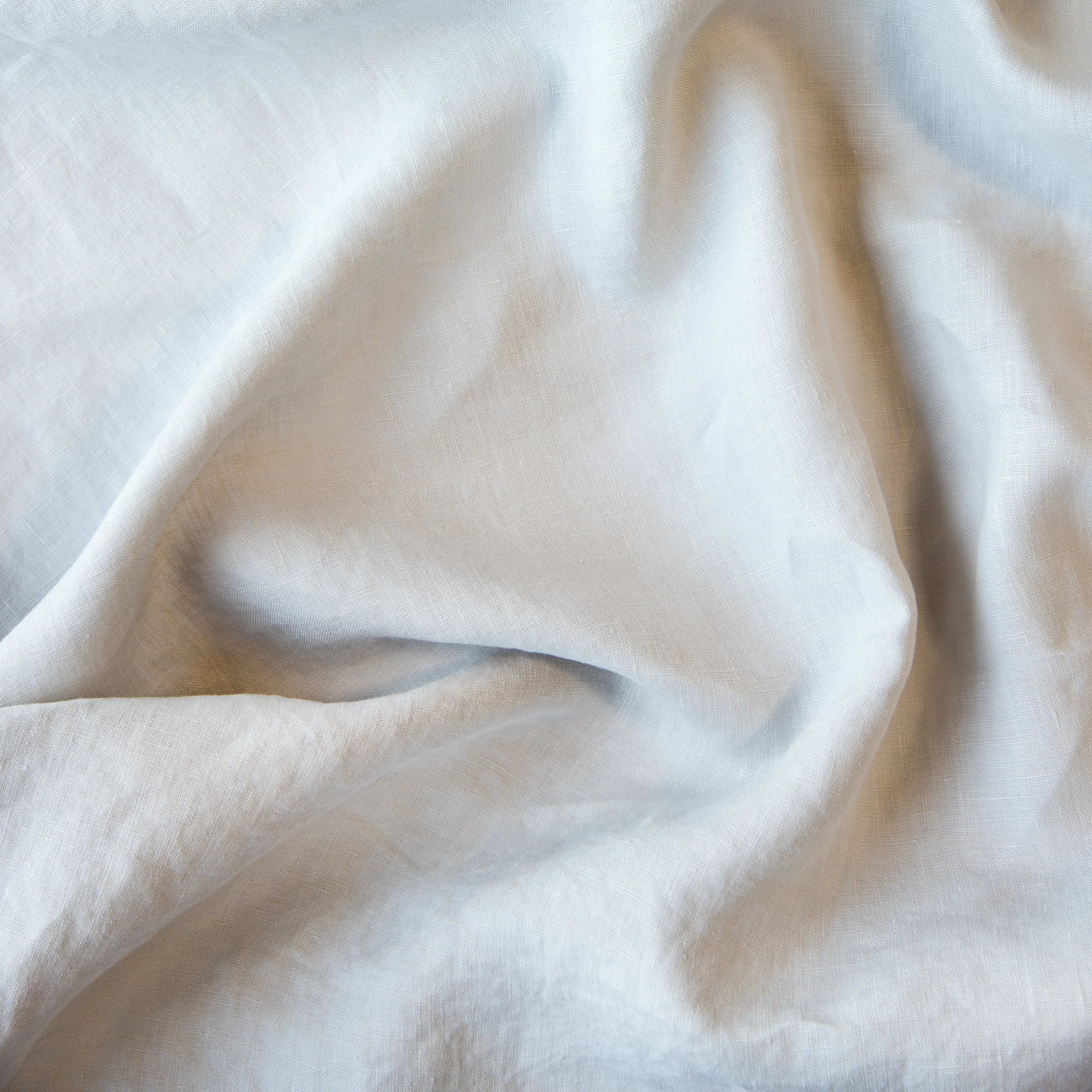 Sterling: A close up of linen in sterling, a silvery neutral light grey. 
