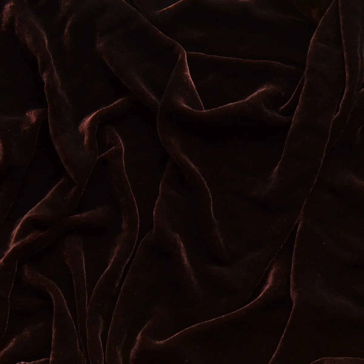 Mahogany: A close up of silk velvet in fig, a richly saturated purple-garnet. 