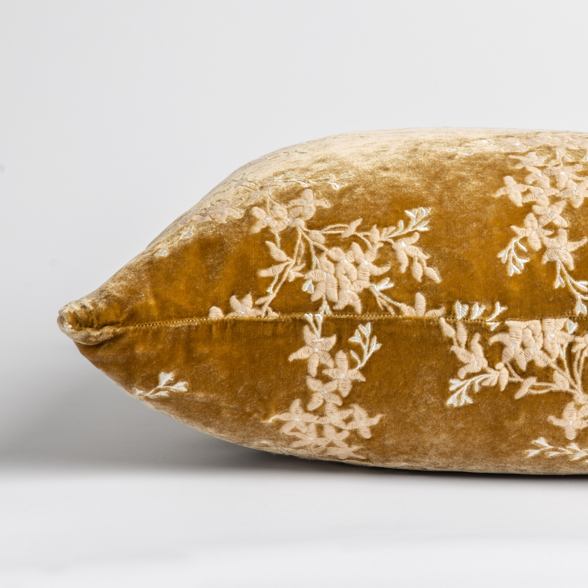 Honeycomb: side view of pillow showing front and back, straight on against a white background.