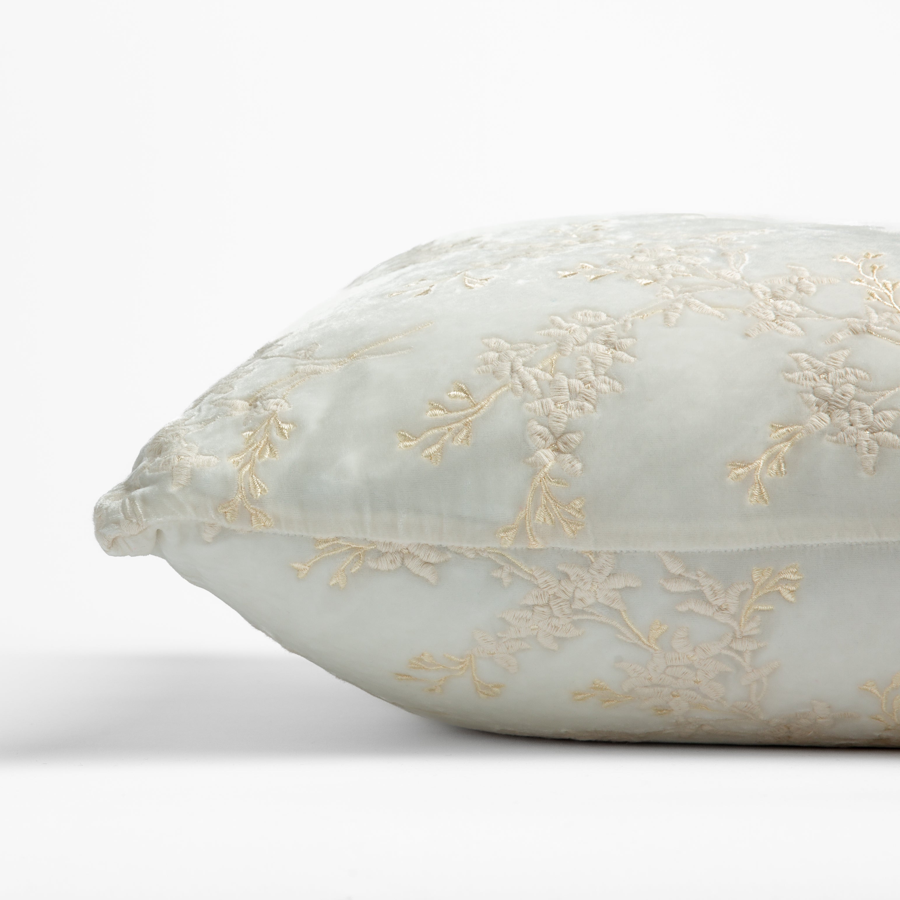Winter White: side view of pillow showing front and back, straight on against a white background.