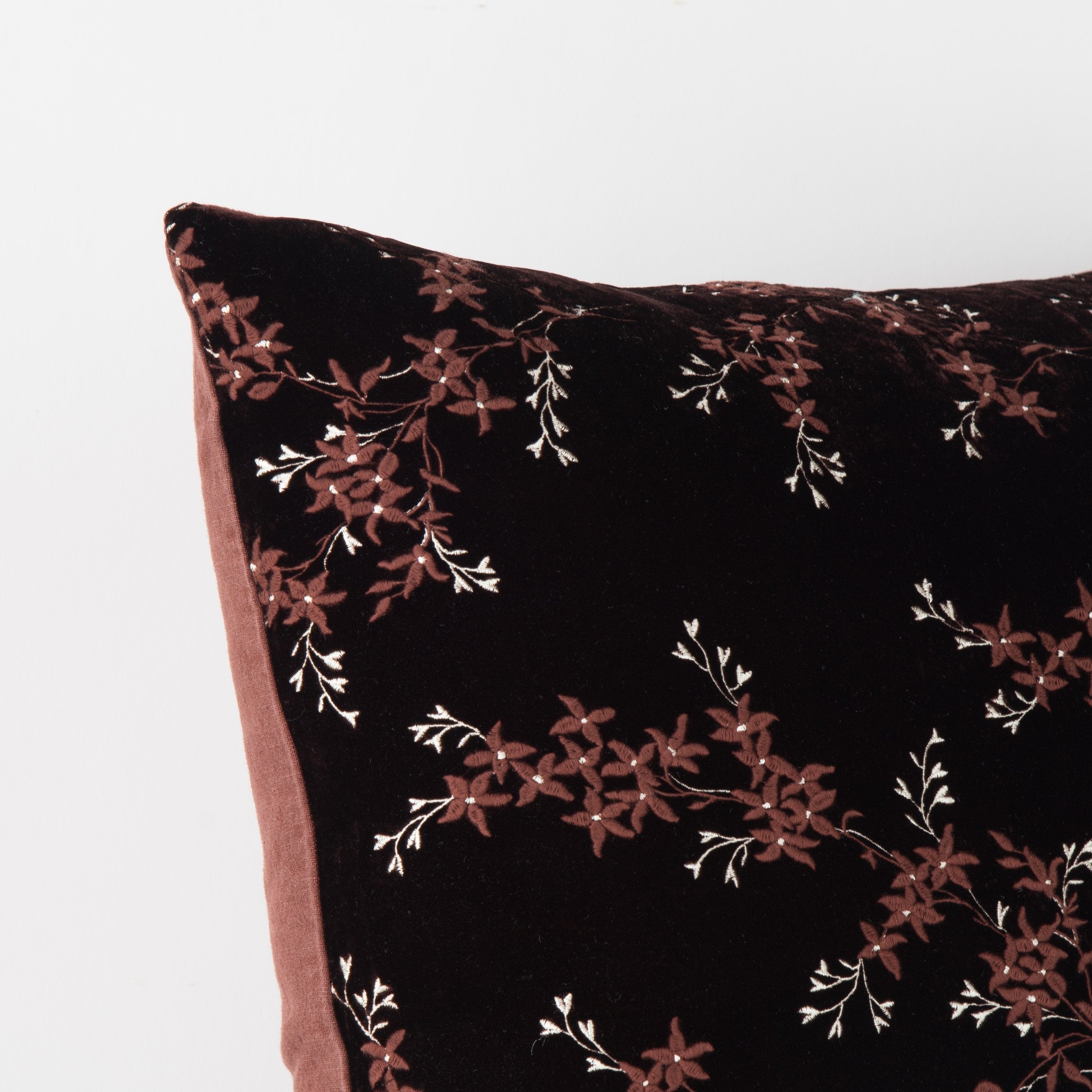 Mahogany: Corner detail close-up, highlighting two-tone embroidery and linen back.