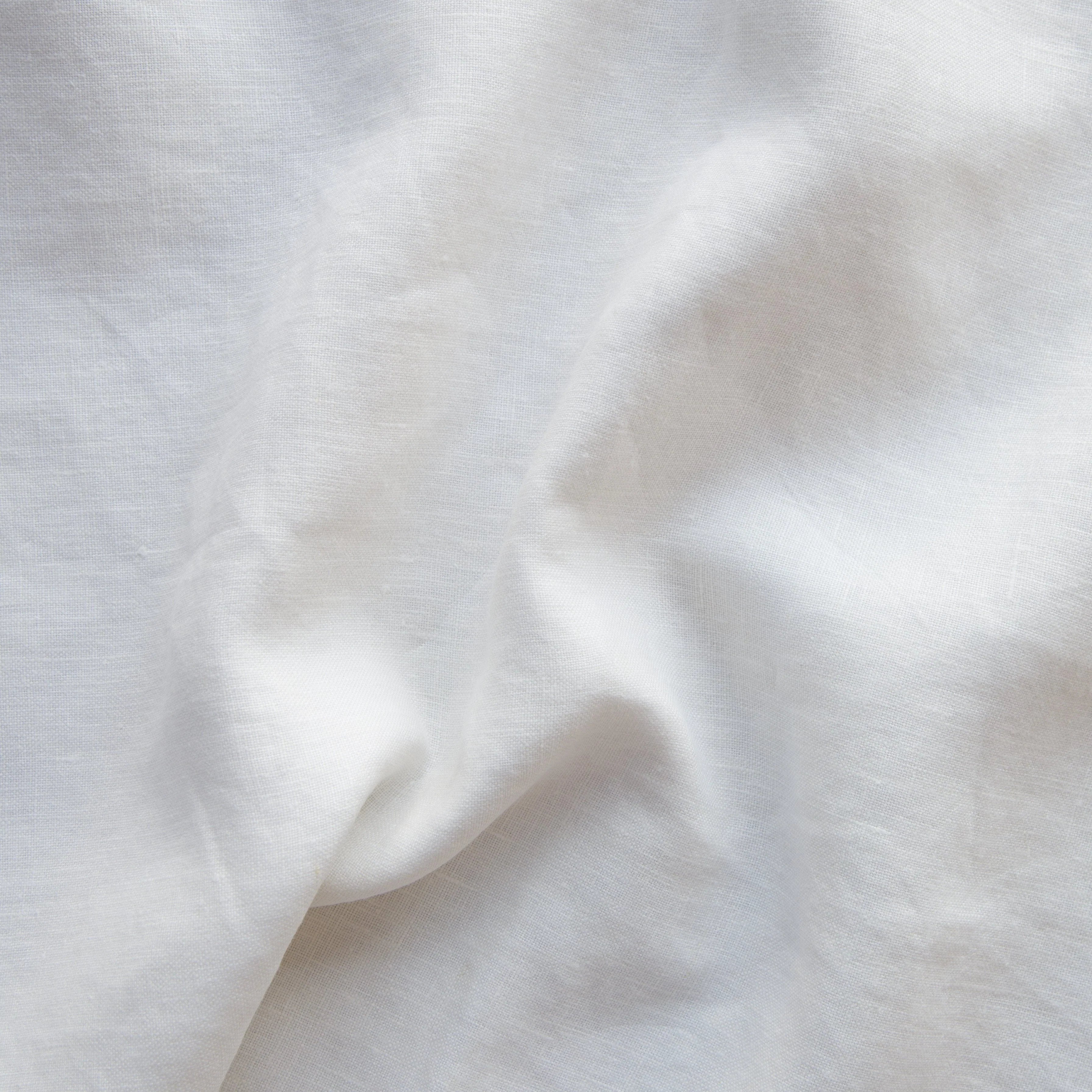 Winter White: A close up of midweight linen in winter white, softer and warmer in tone than classic white. 