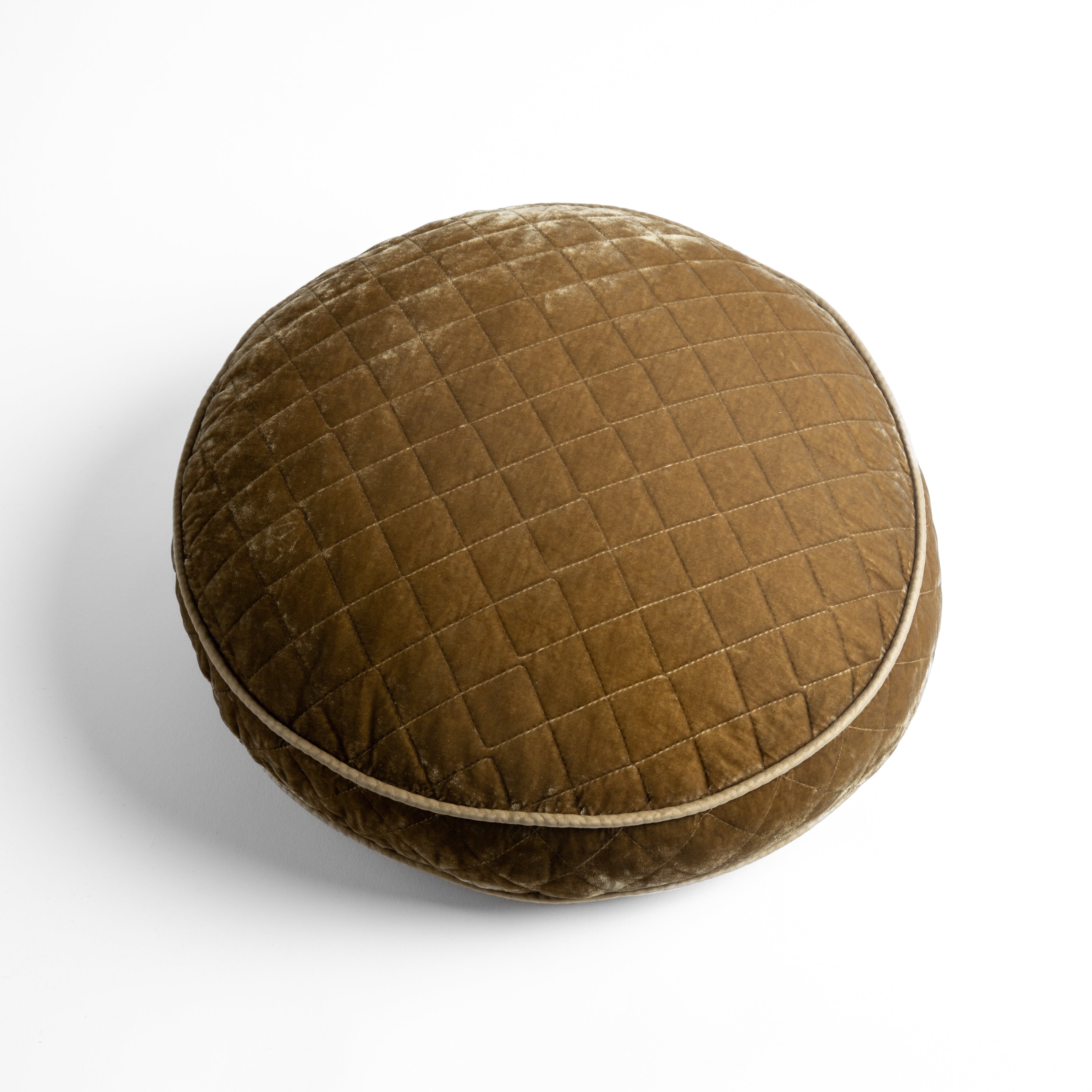 Honeycomb: overhead at a slight angle against a white background, the face and gusset of the pillow are visible.