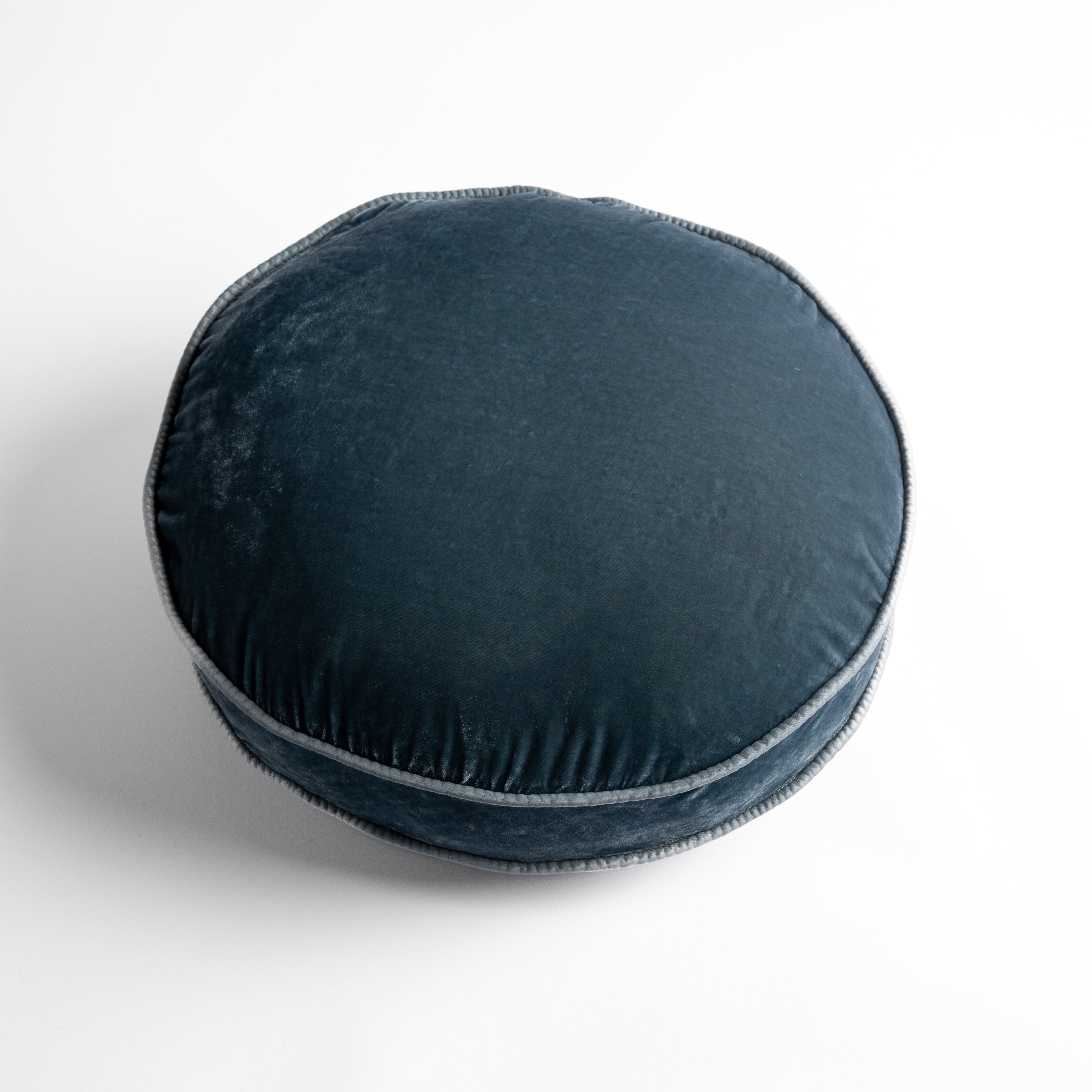 Mineral: Silk velvet round pillow with satin trim, overhead angle shows gusset.