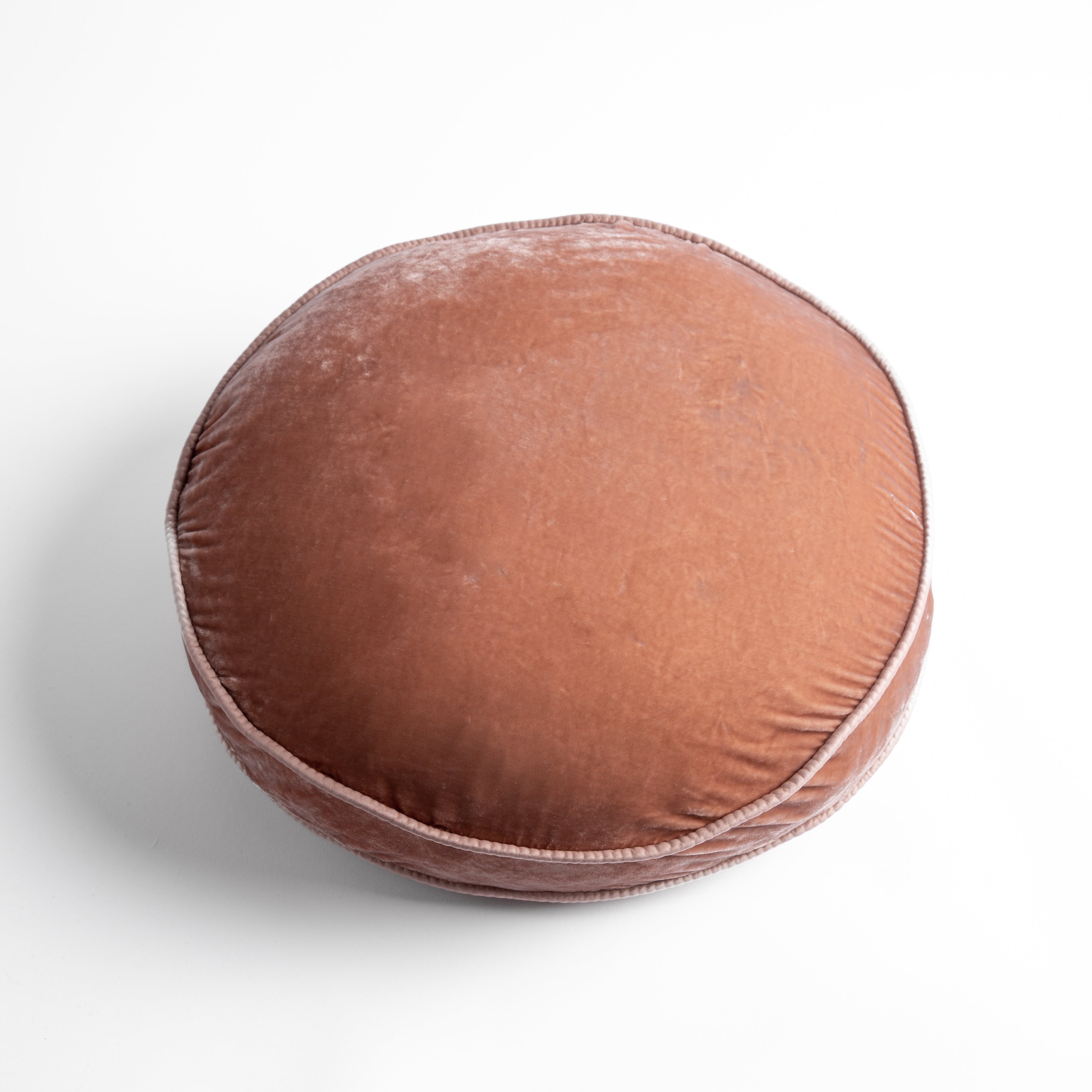 Rouge: Silk velvet round pillow with satin trim, overhead angle shows gusset.