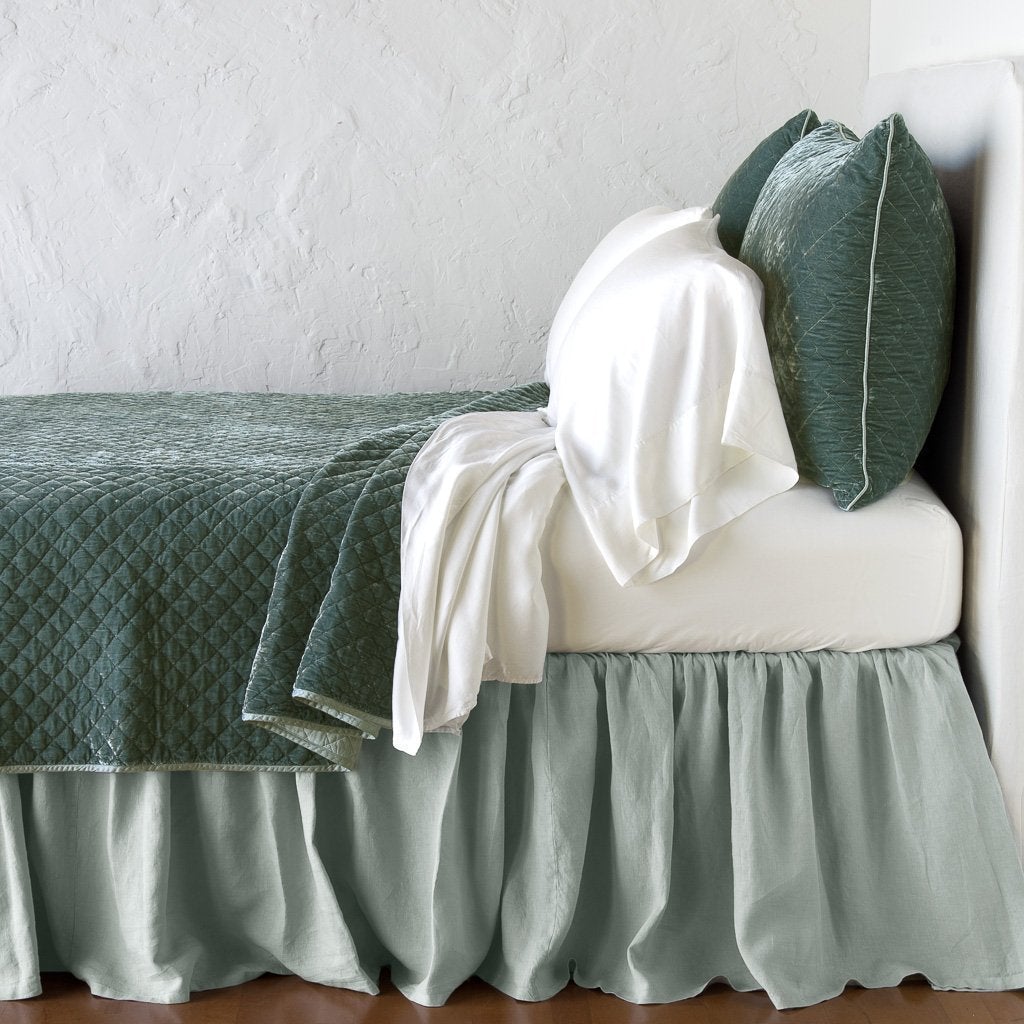 Eucalyptus: shams with matching coverlet and white sheeting - side view.