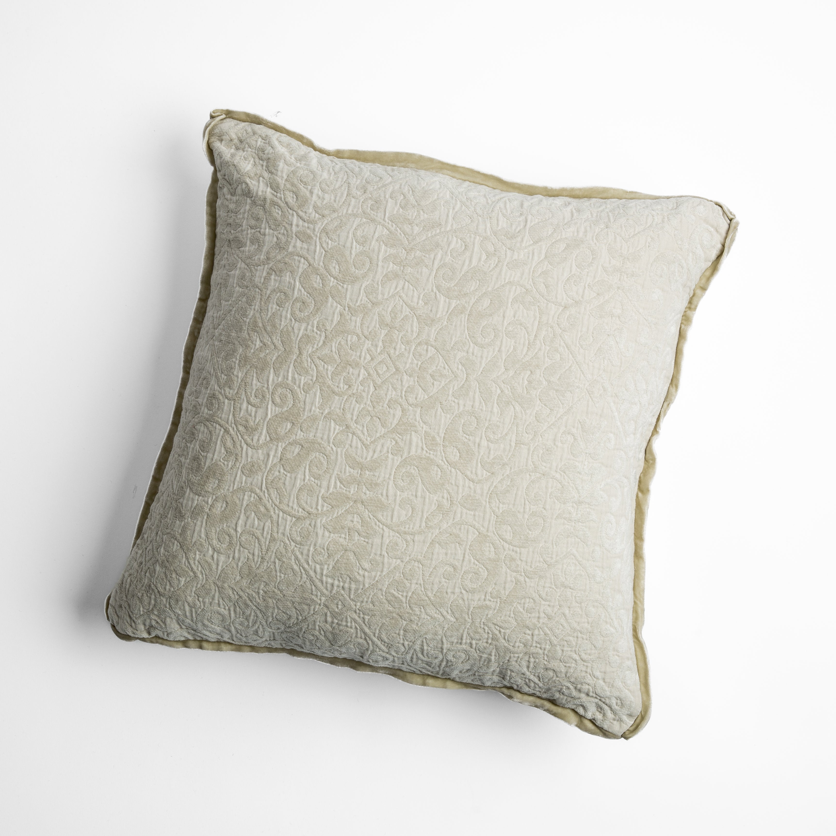 Parchment: cotton chenille jacquard 18x18 pillow shown from overhead to display the pillow's face and silk velvet trim — overhead against a white background.