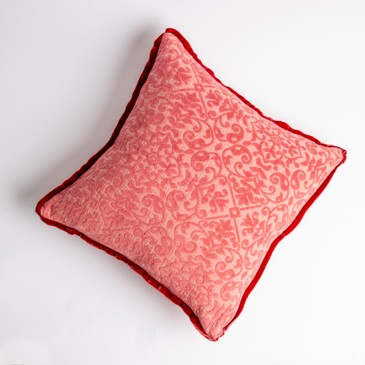 Poppy: cotton chenille jacquard 18x18 pillow shown from overhead to display the pillow's face and silk velvet trim — overhead against a white background.