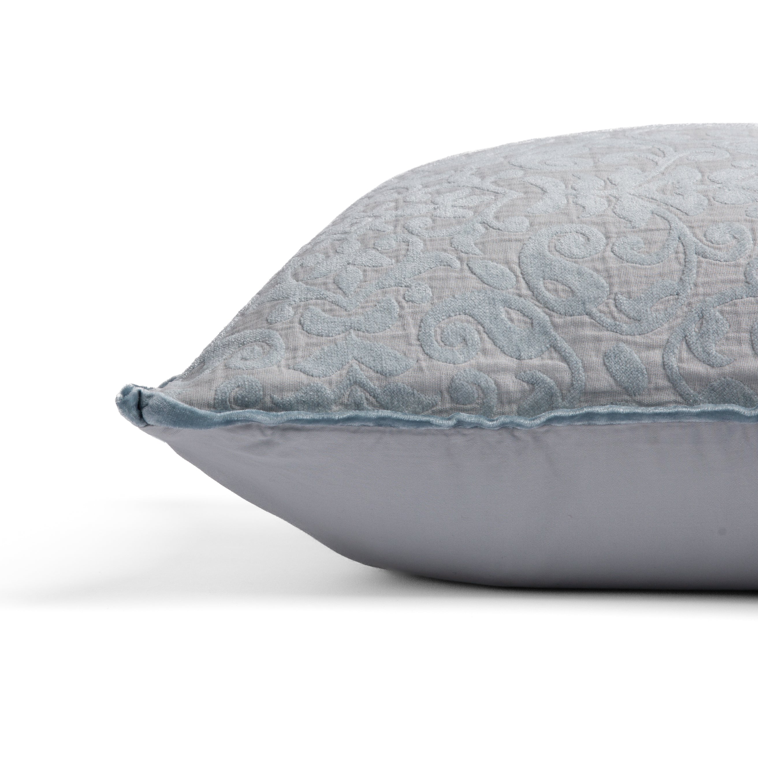 Cloud: side view of 18x18 pillow shows cotton sateen back and silk velvet trim detail — close up against a white background. 