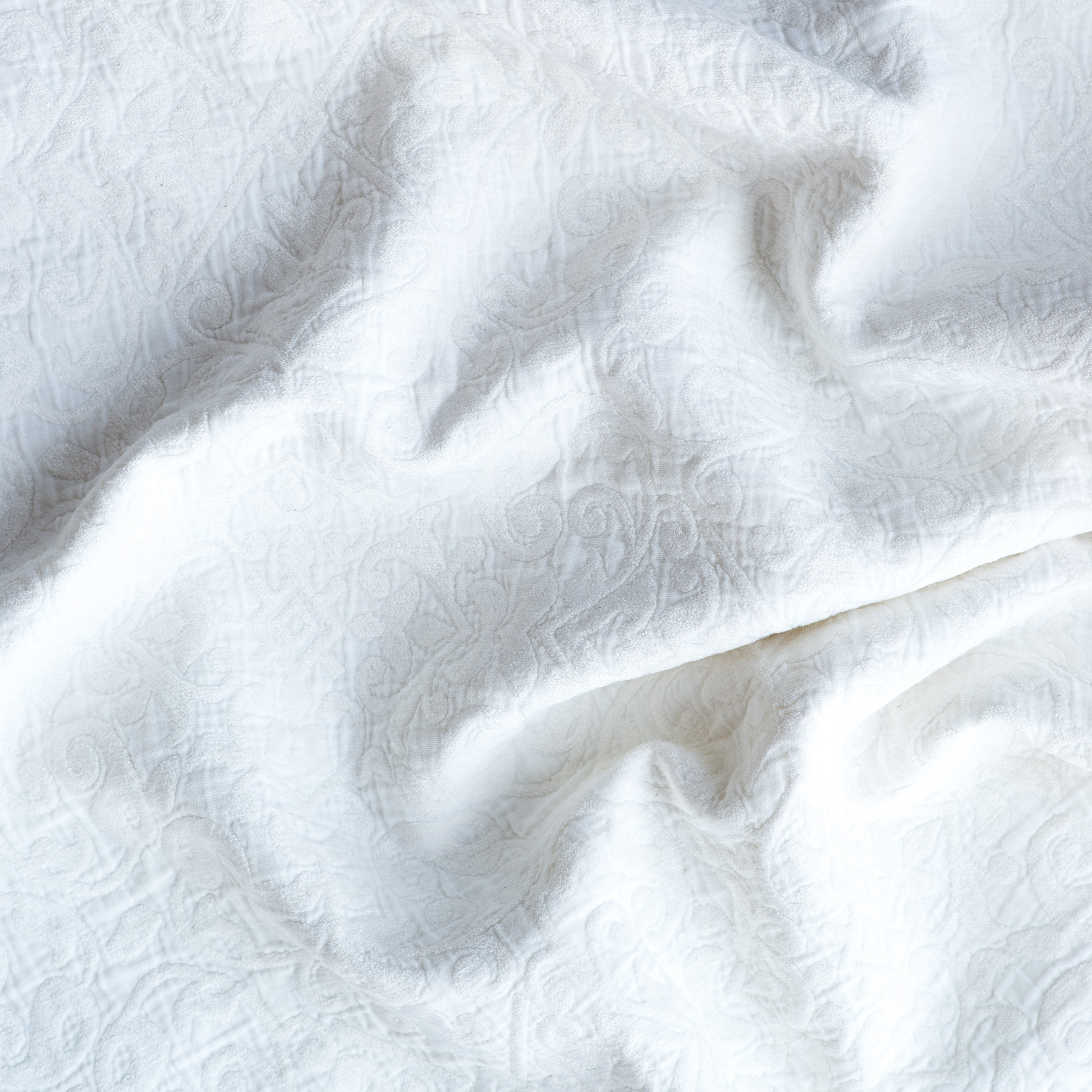 White: A close up of Vienna cotton chenille jacquard in white.